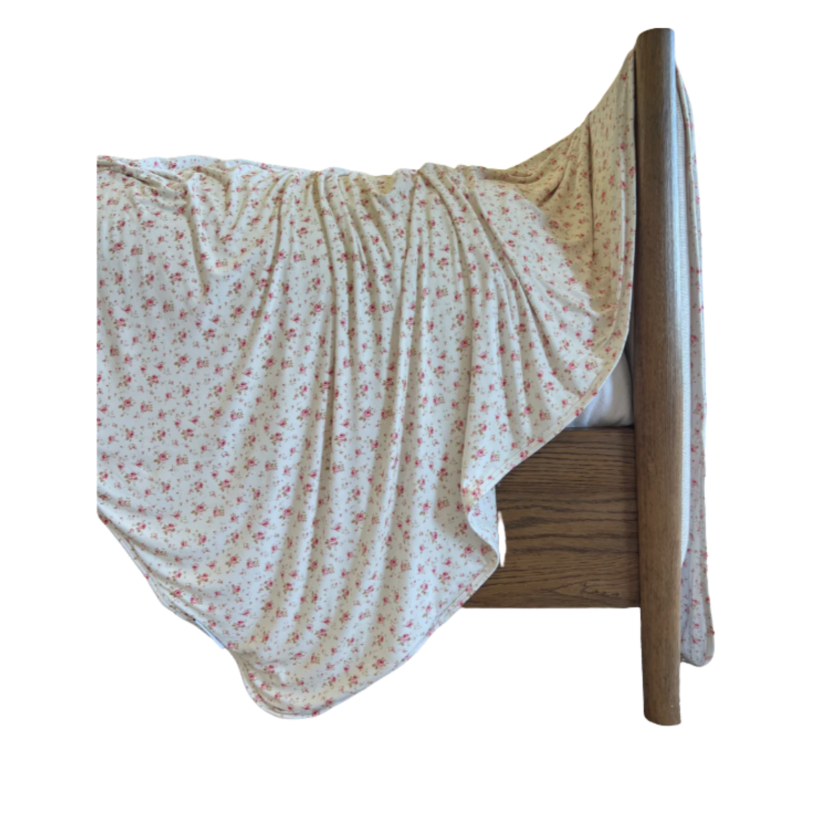 Afternoon Tea Adult Swaddle draped on bed